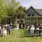 Wedding ceremony in front of the barn