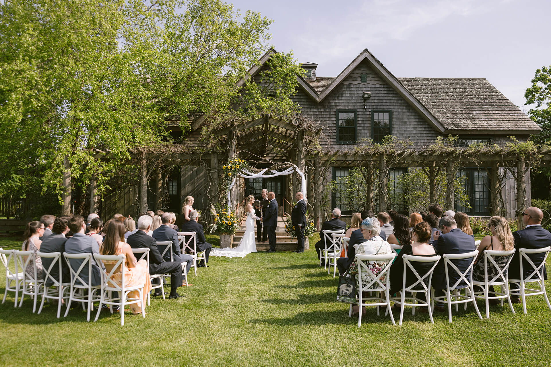 Wedding ceremony in from of the barn