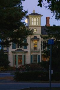 full moon behind Jedediah Hawkins Inn